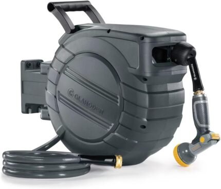 The retractable garden hose providing efficient watering for plants with brass connectors.